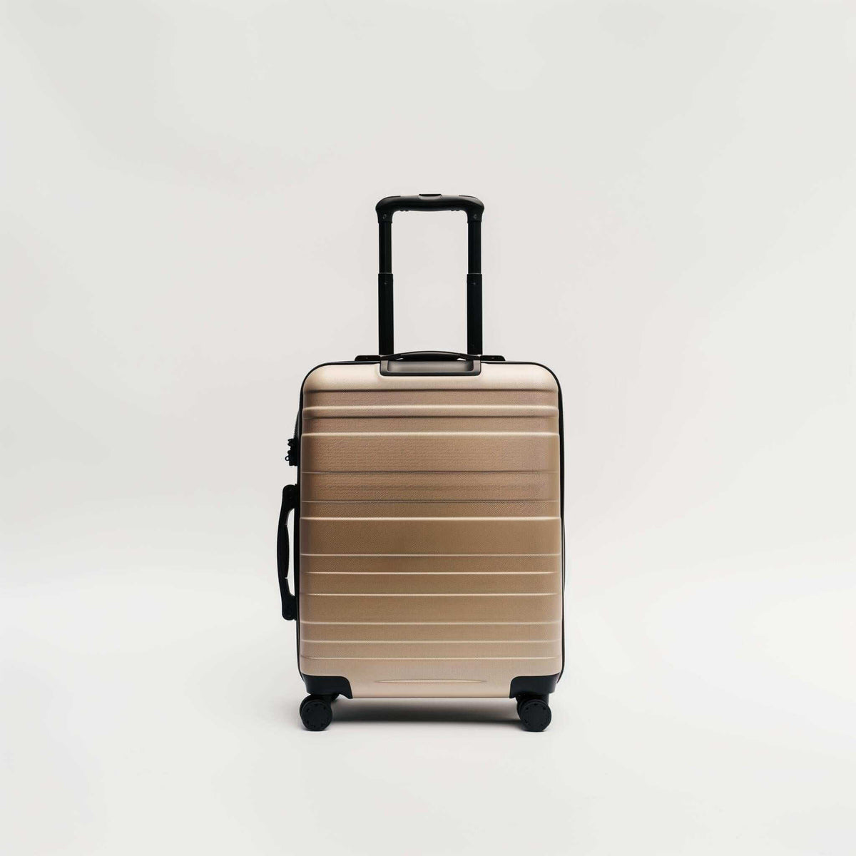 Valise moderne rigide de nouvelle génération avec poignée télescopique et roulettes.